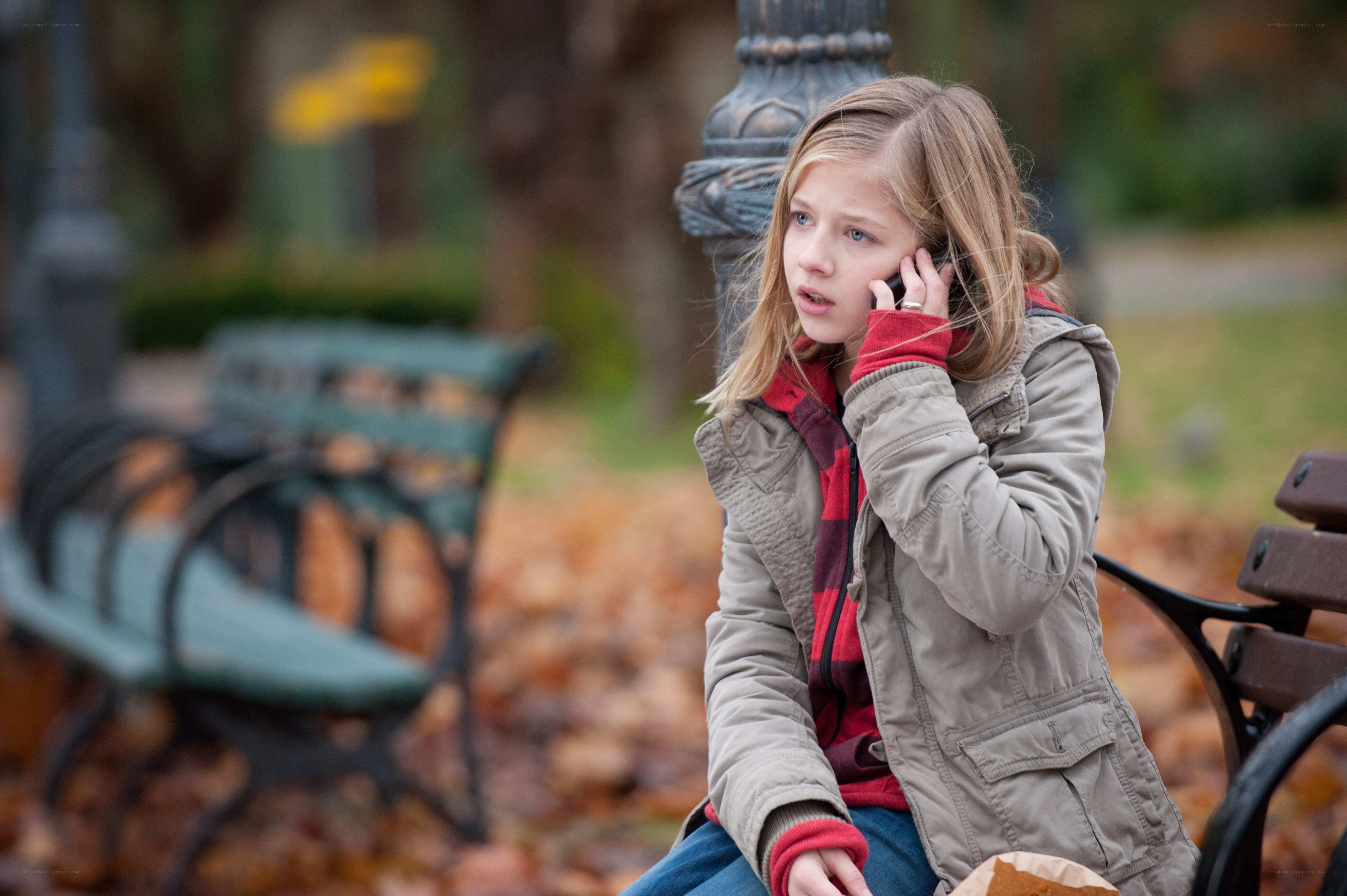 girl on phone in park