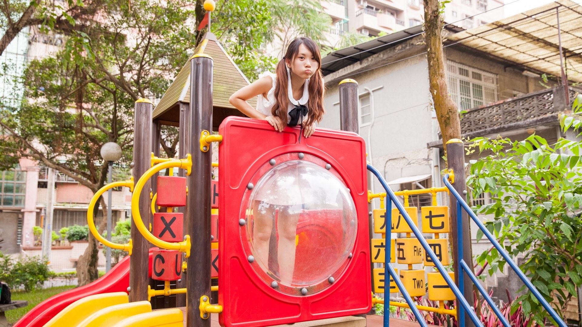 Girl on playground structure