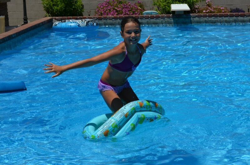 Girl on Pool Float