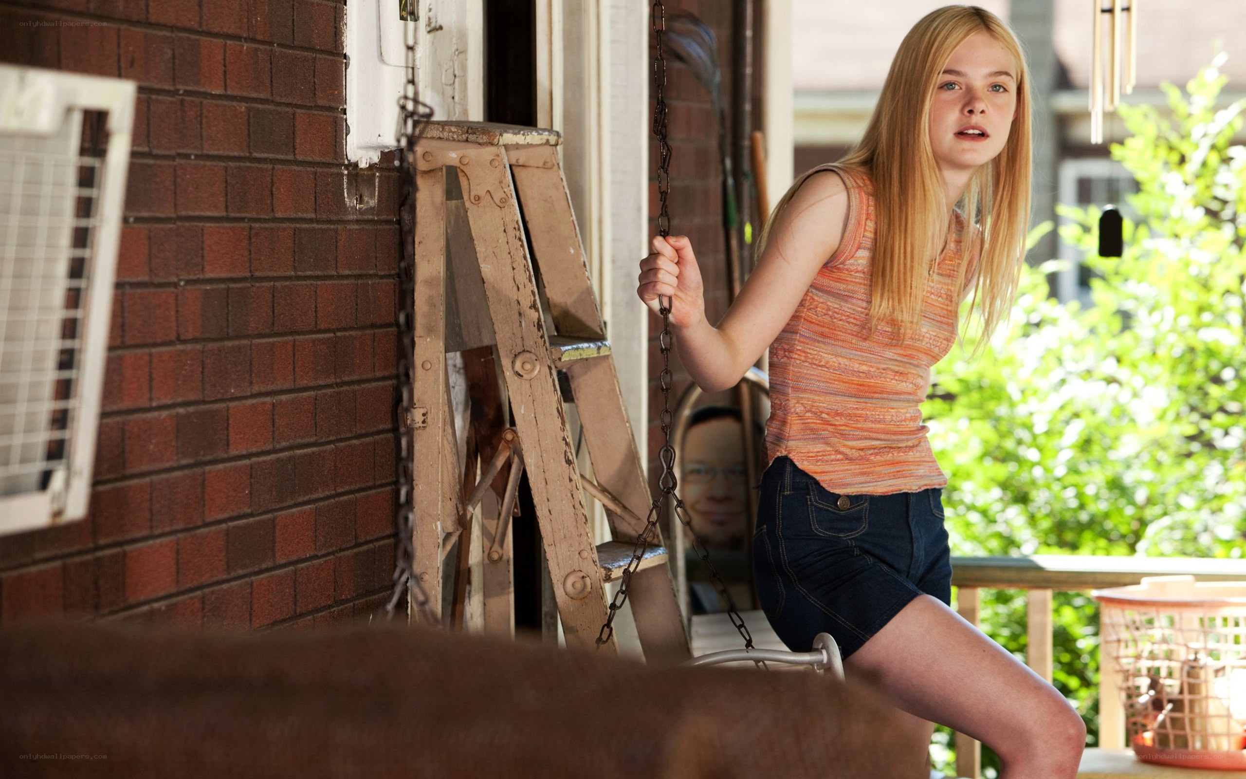 girl on porch swing