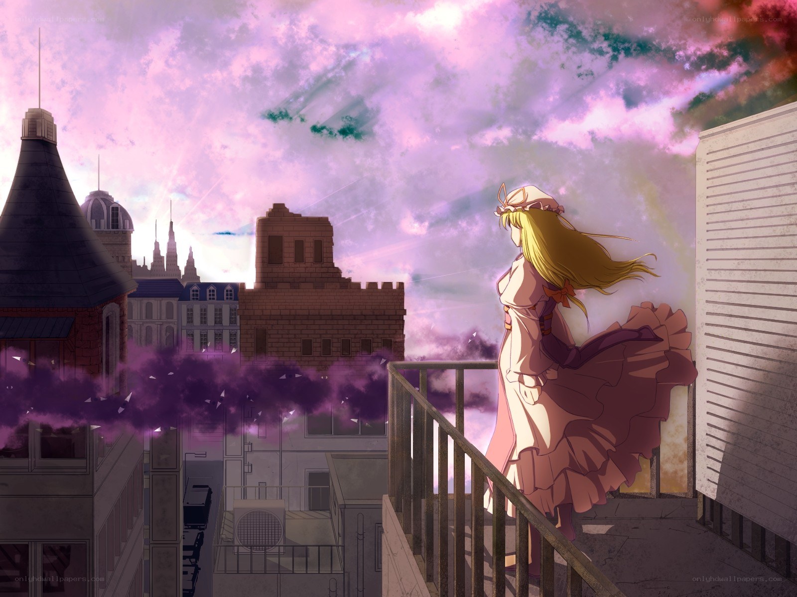 girl on rooftop at sunset