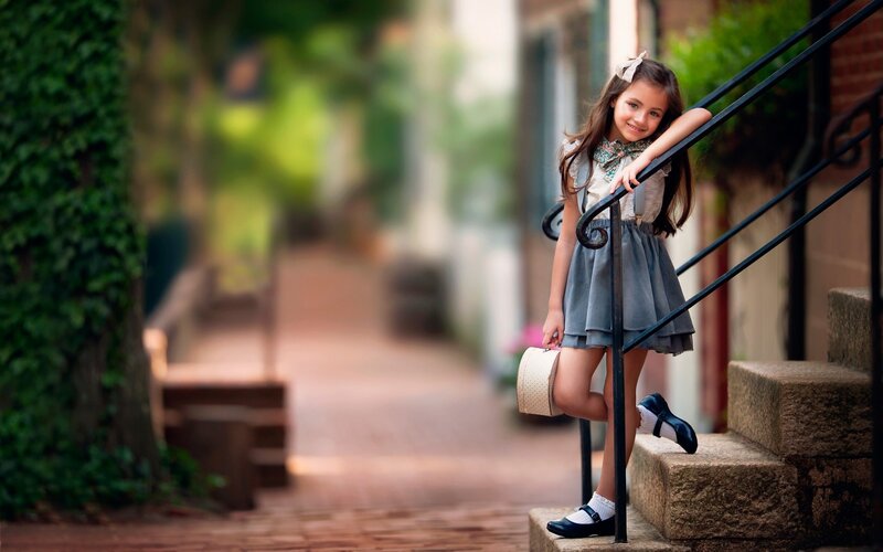 Girl on Stone Steps — Gray