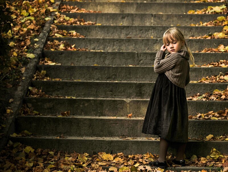 Girl on Stone Steps