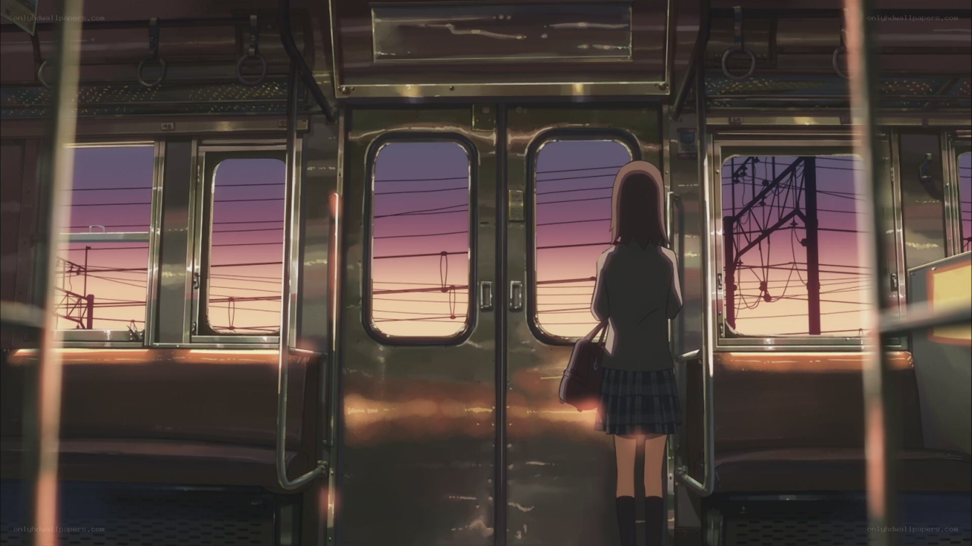 girl on train at sunset