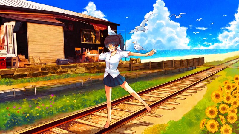 Girl on train tracks by the sea