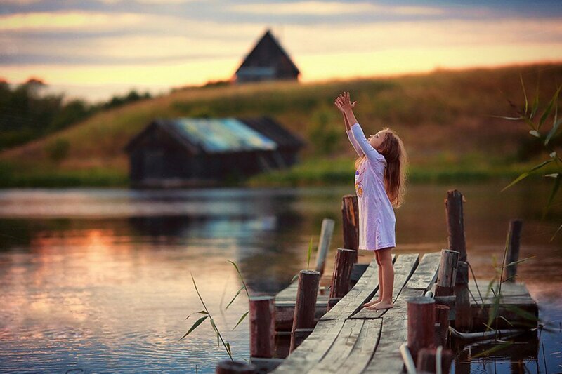 Girl on Wooden Dock — Orange