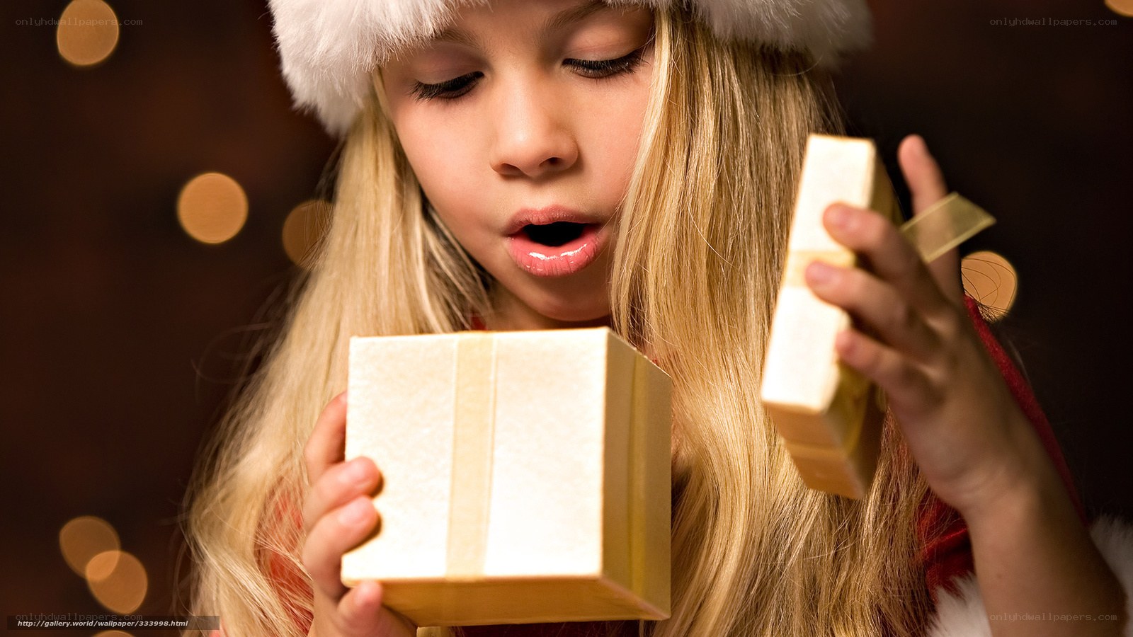 girl opening christmas gift