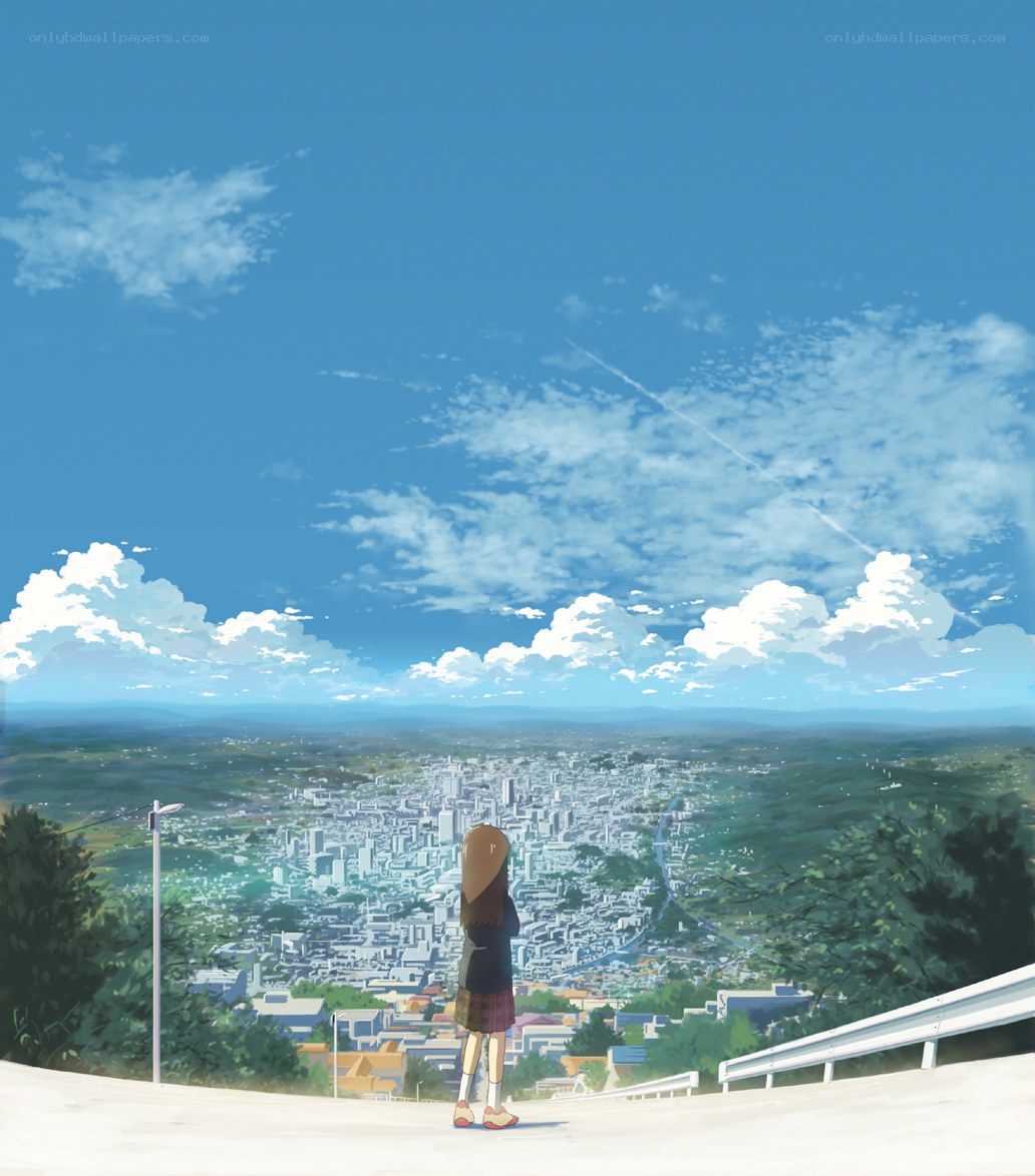 Girl overlooking a city
