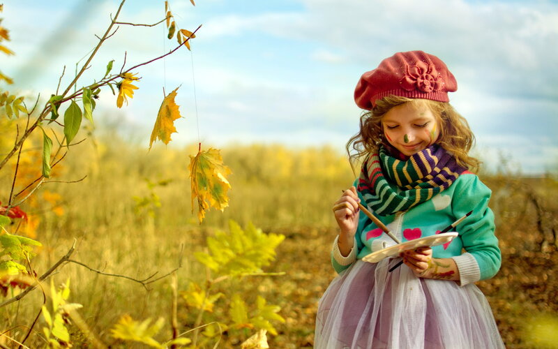 Girl Painting Outdoors