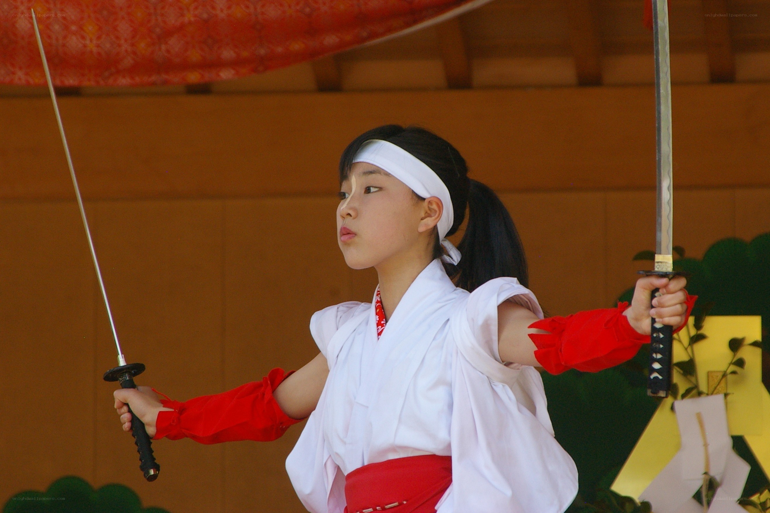 Girl performing with swords