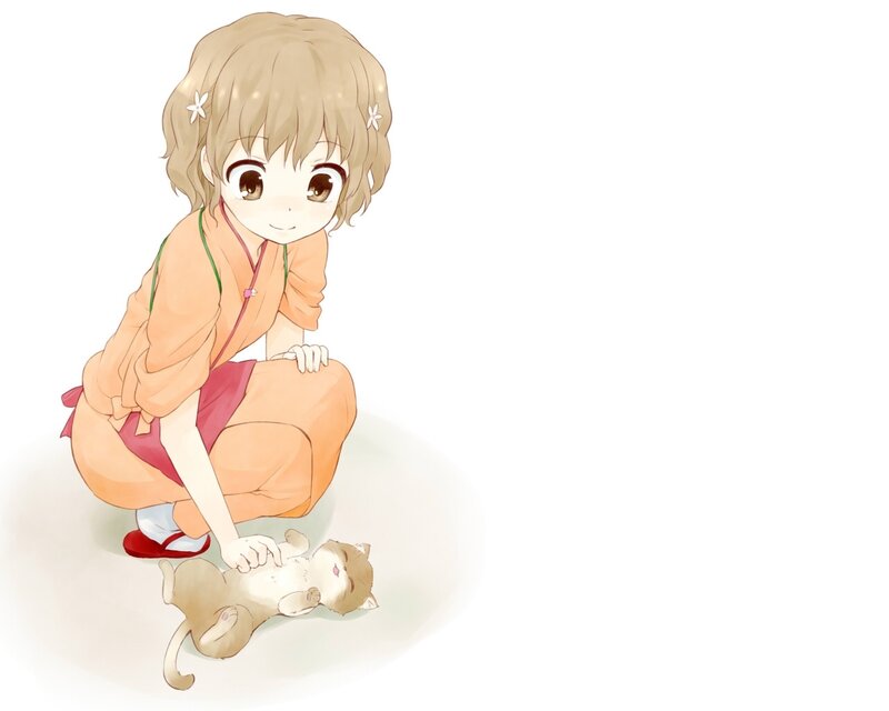 girl petting a kitten