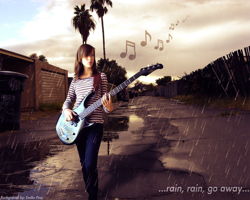 girl playing bass in the rain