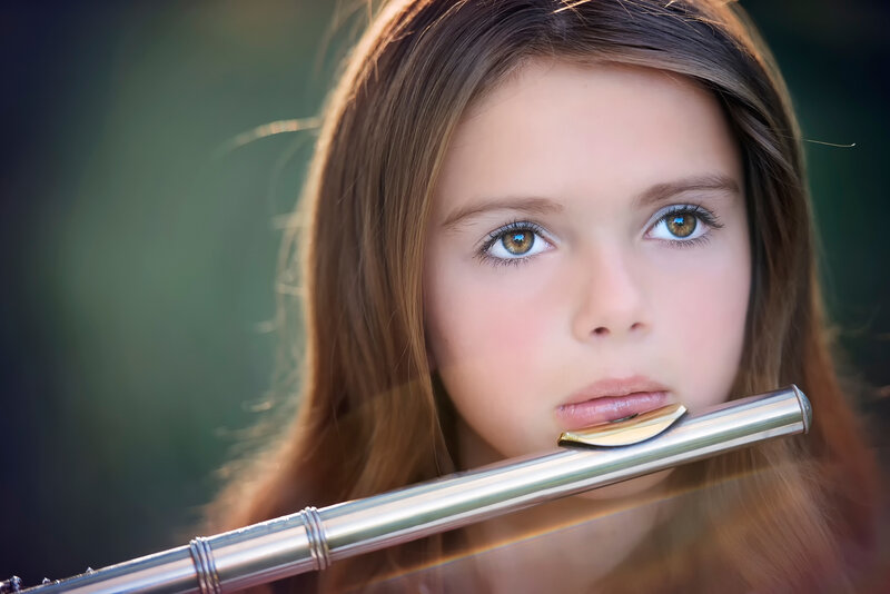 Girl Playing Flute — Brown