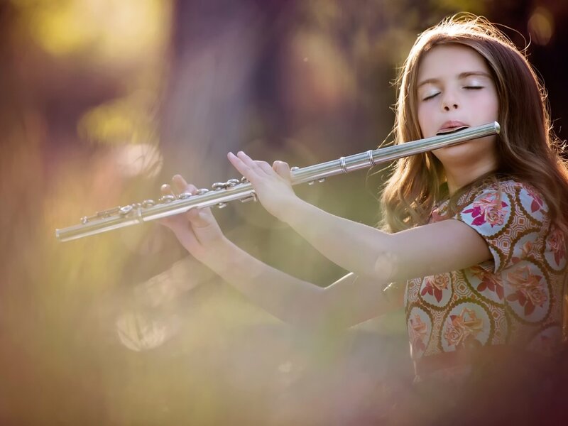 Girl Playing Flute — Gold