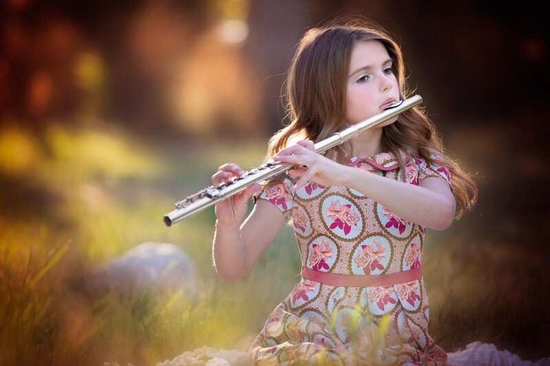 Girl Playing Flute — Pink, Serene, Sunset