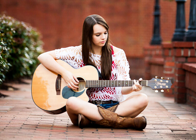 Girl Playing Guitar — Brown, Calm
