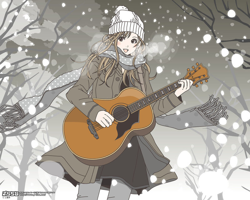 Girl playing guitar in snow