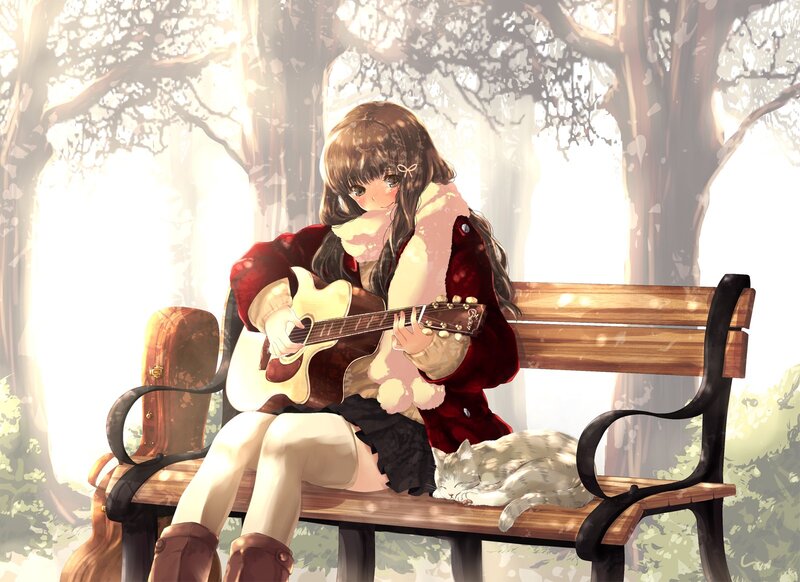 Girl playing guitar on bench