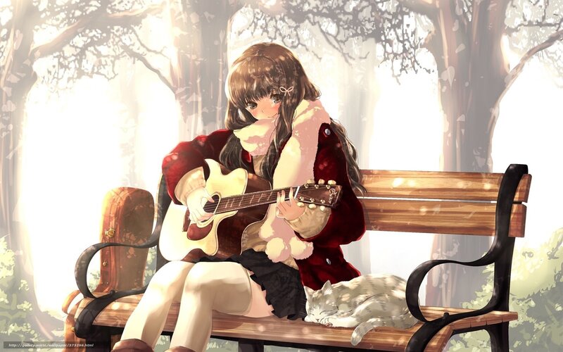 Girl playing guitar on bench