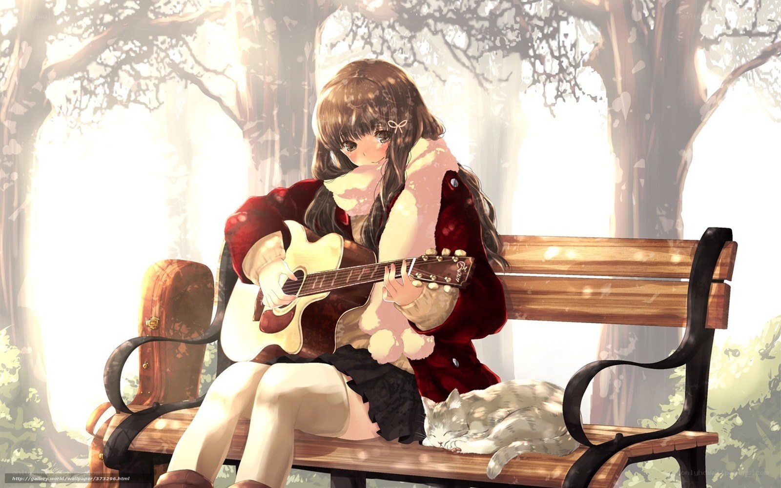Girl playing guitar on bench