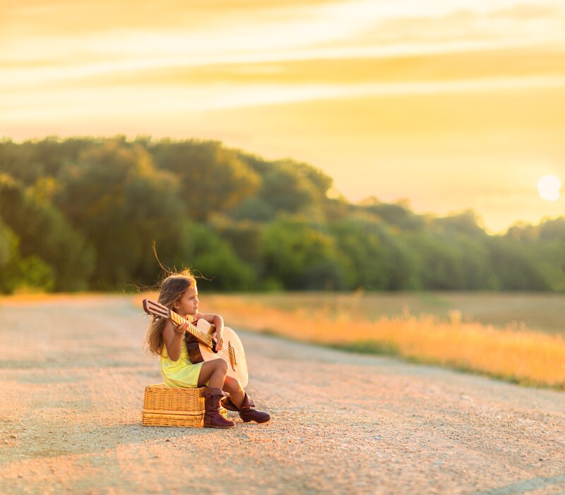Girl Playing Guitar — Yellow