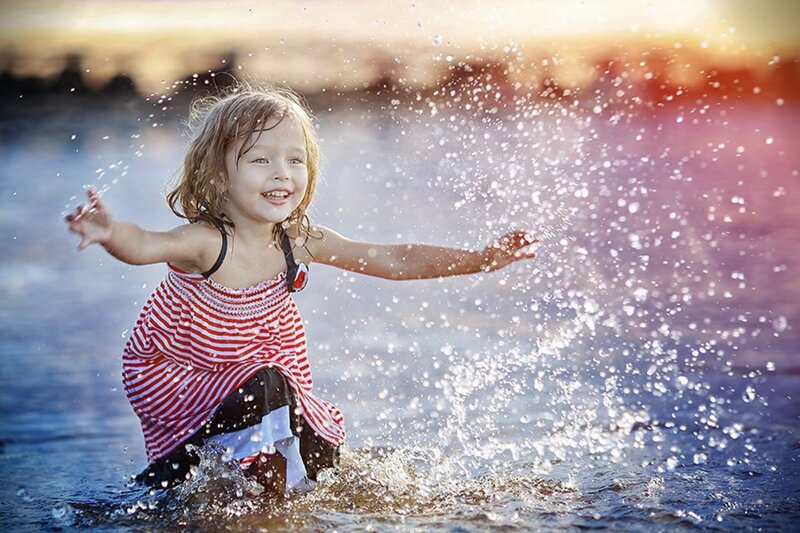 Girl Playing in Water — Blue, Playful