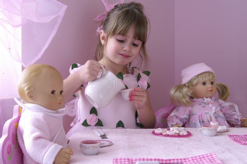 Girl Playing Tea Party