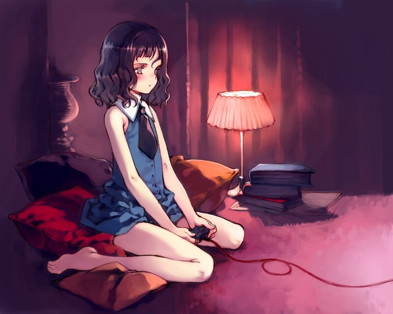 girl playing video game at night