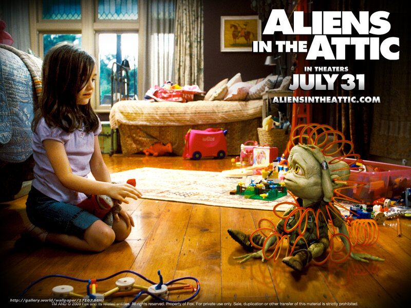 Girl Playing with Alien Toy