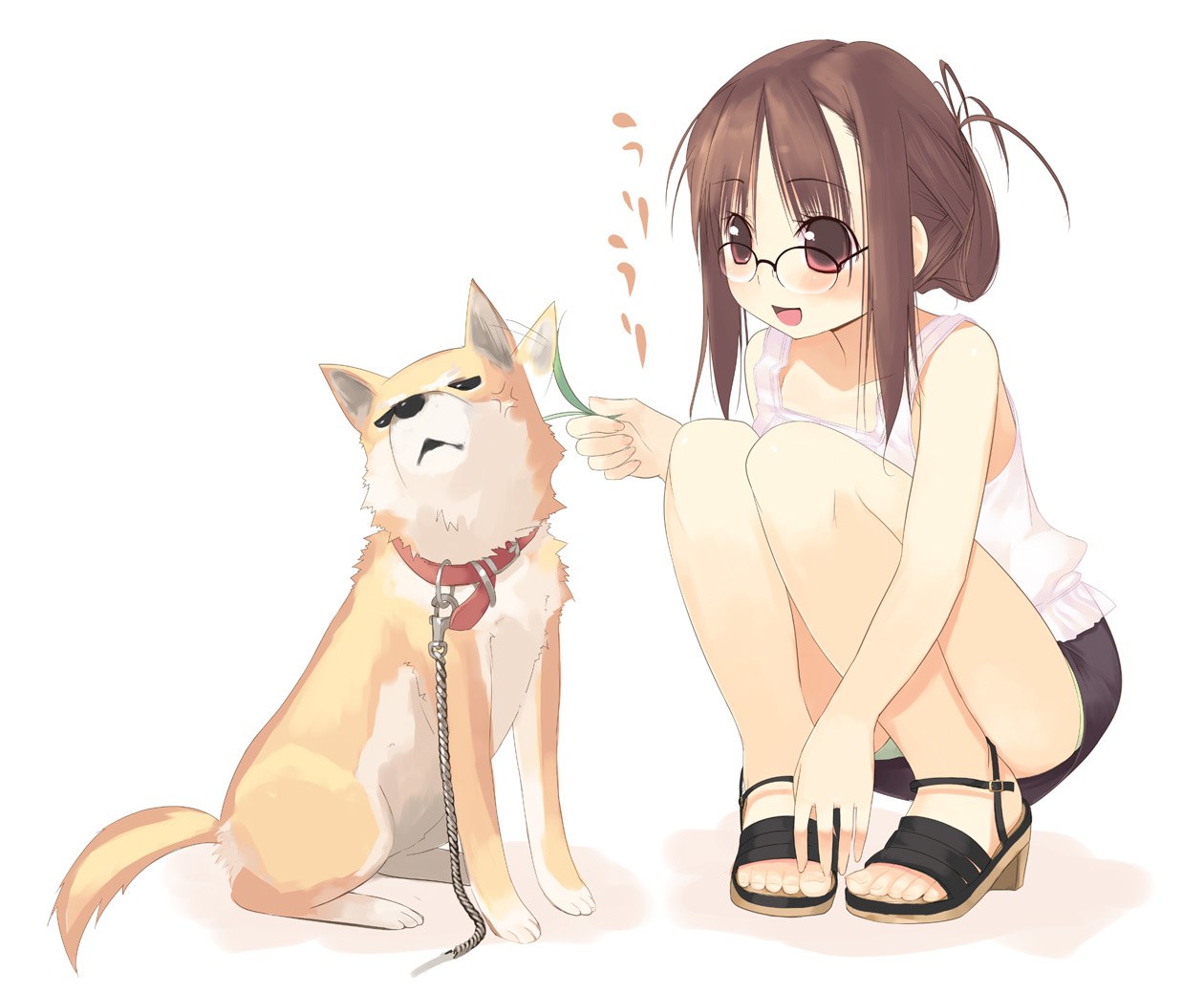 Girl playing with dog