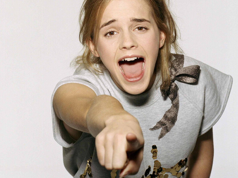 girl pointing at camera
