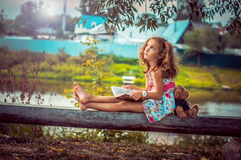 Girl Reading Book — Blue, Serene, Afternoon