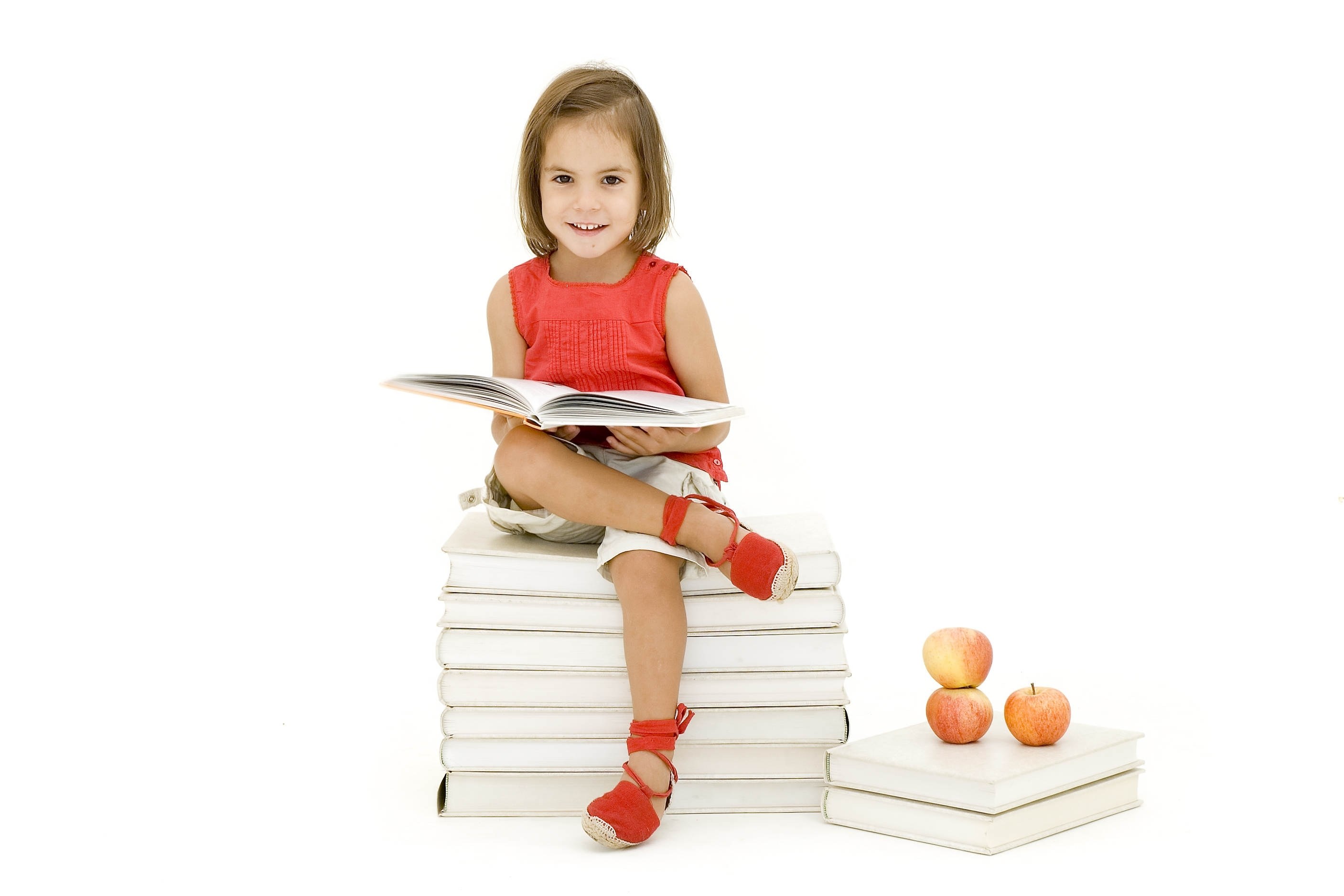 girl reading book on books
