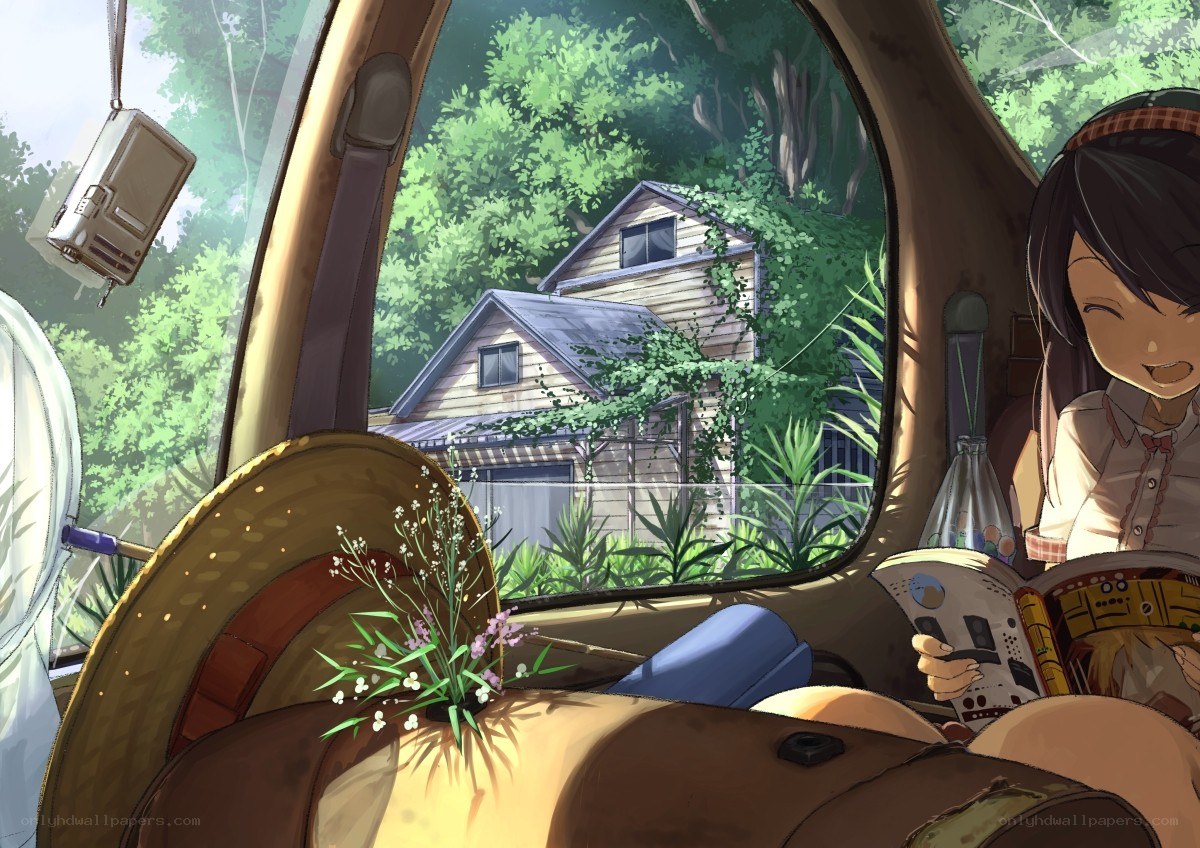 Girl reading in a car