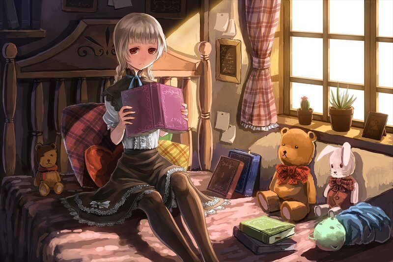 girl reading in a cozy room