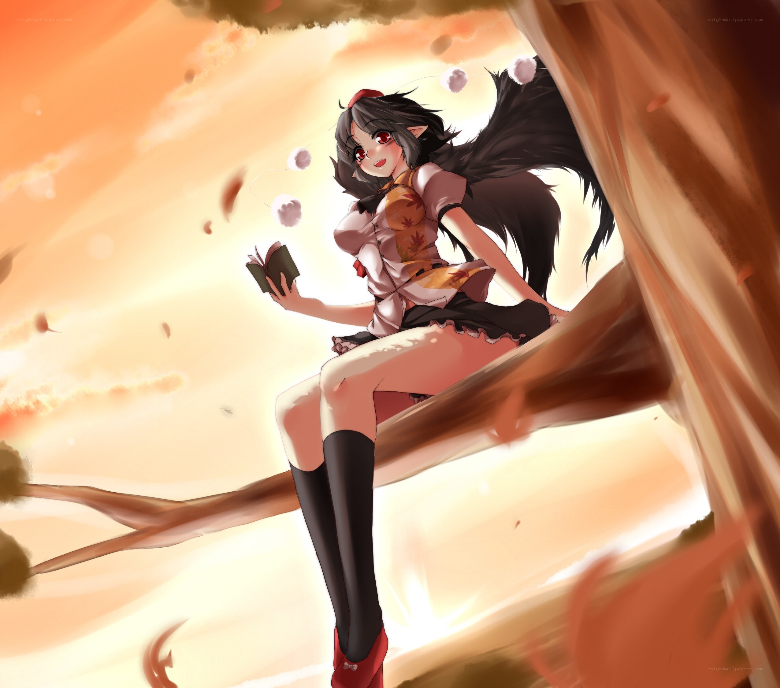 girl reading in a tree