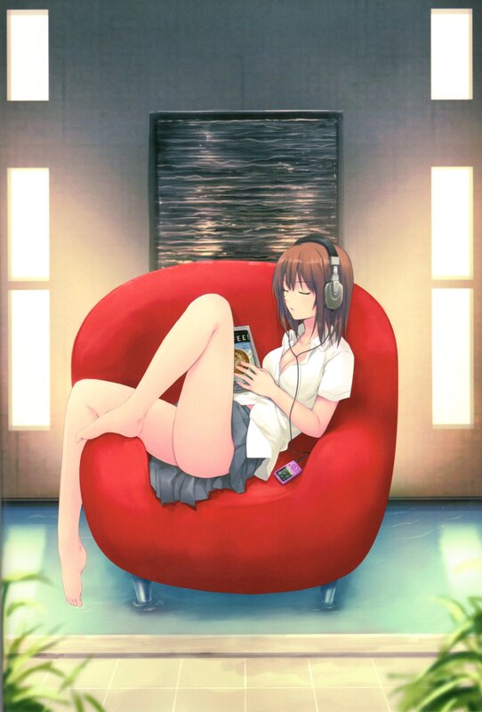 Girl reading in red chair