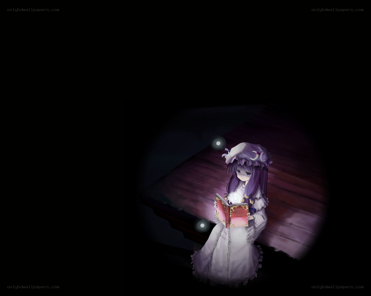 girl reading in the dark