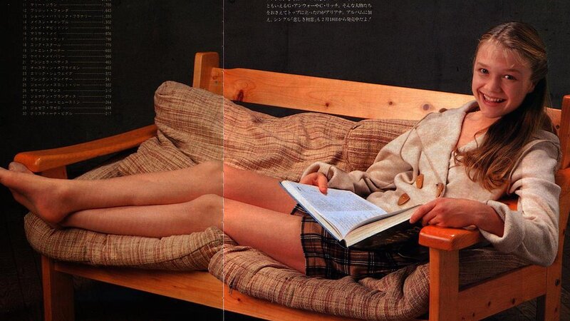 girl reading on a bench