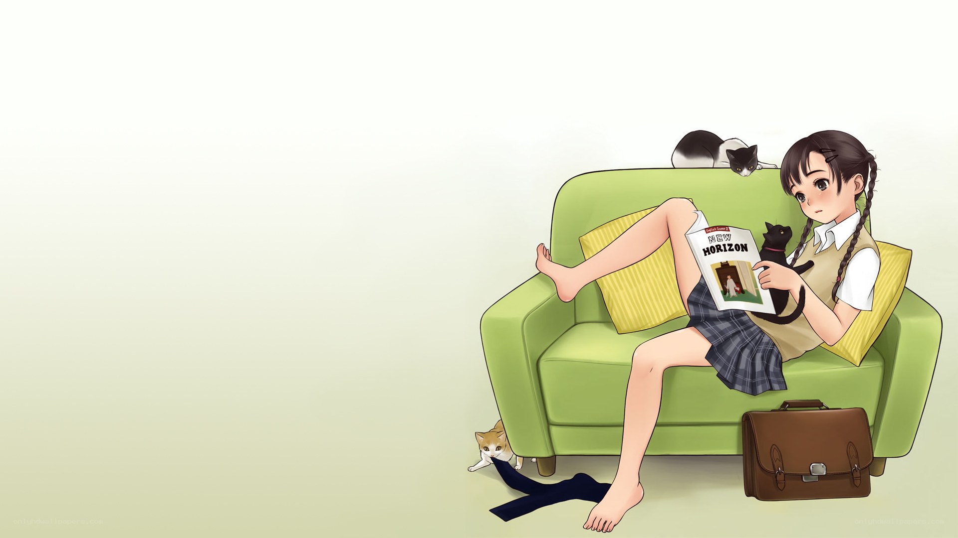 Girl reading on a sofa