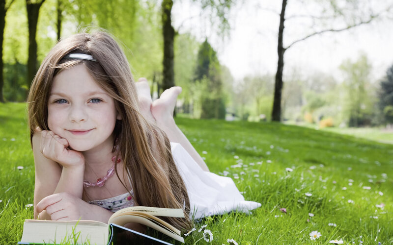 Girl Reading on Grass — Green, Peaceful