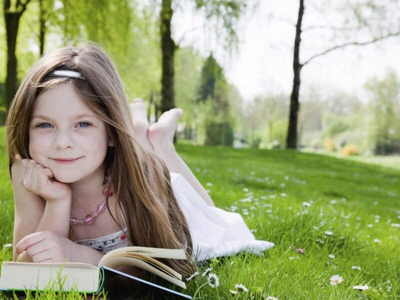 Girl Reading on Grass — Green, Serene