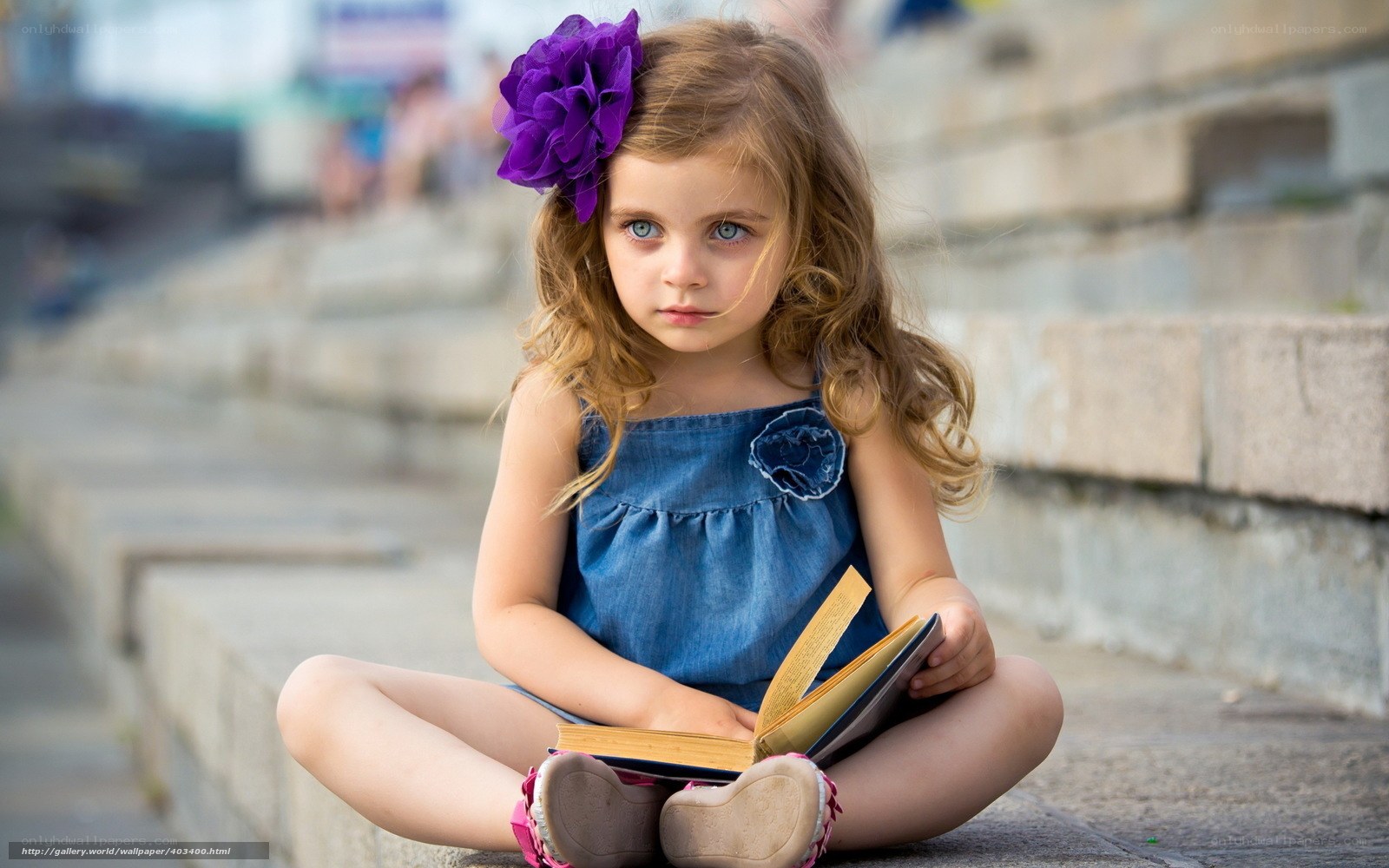 girl reading on steps