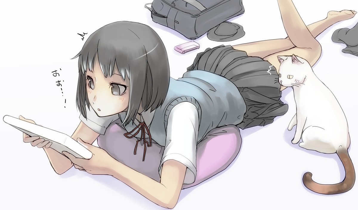 girl reading with cat