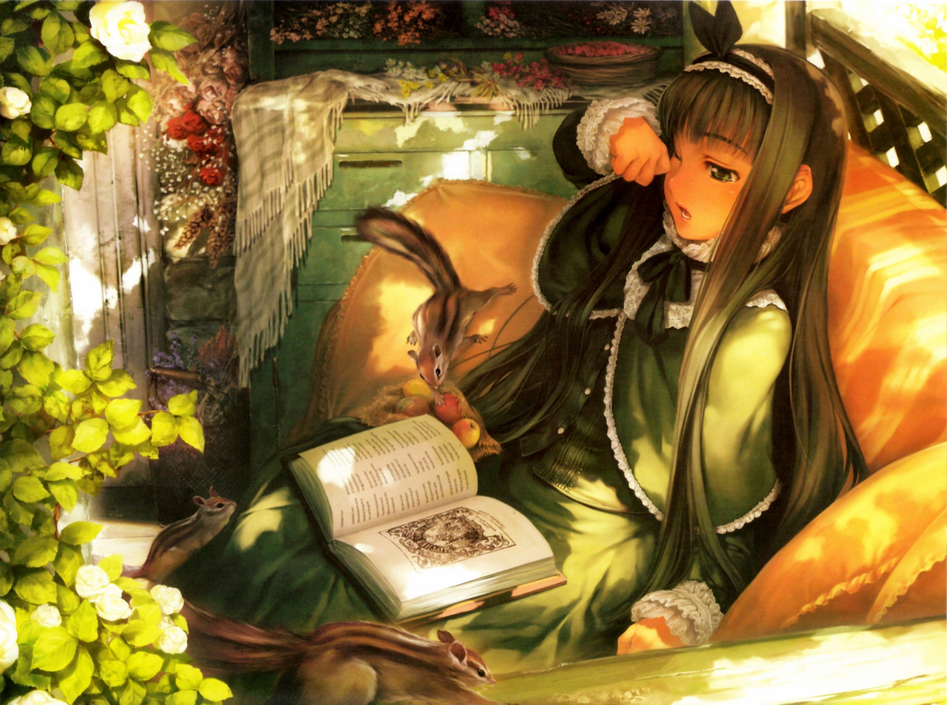 Girl reading with chipmunks