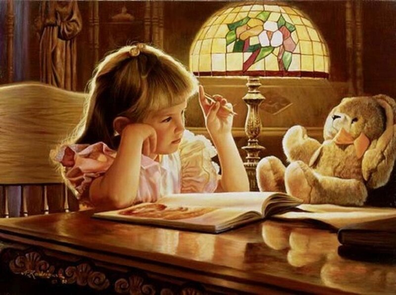Girl reading with teddy bear
