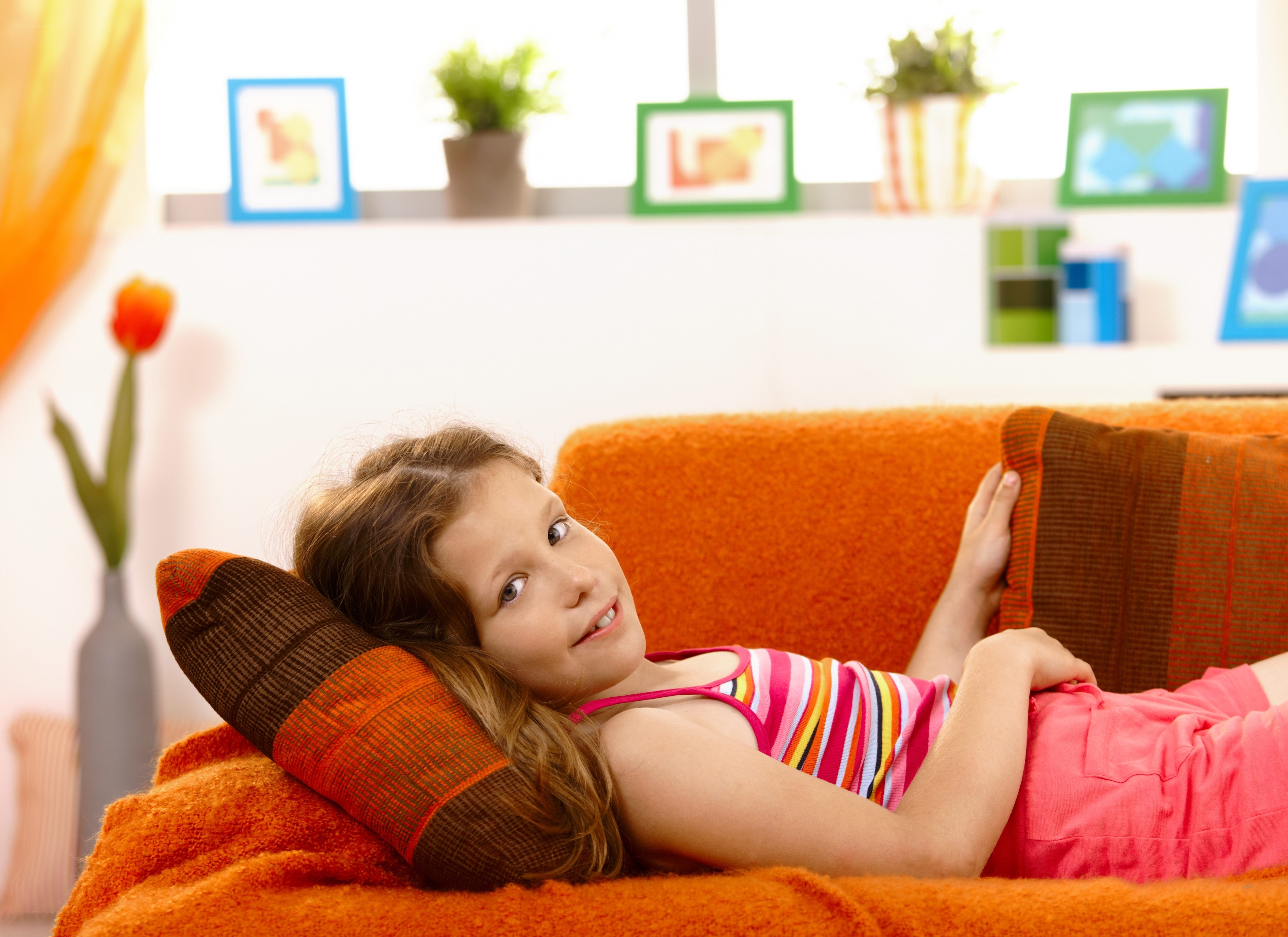 Girl relaxing on a sofa