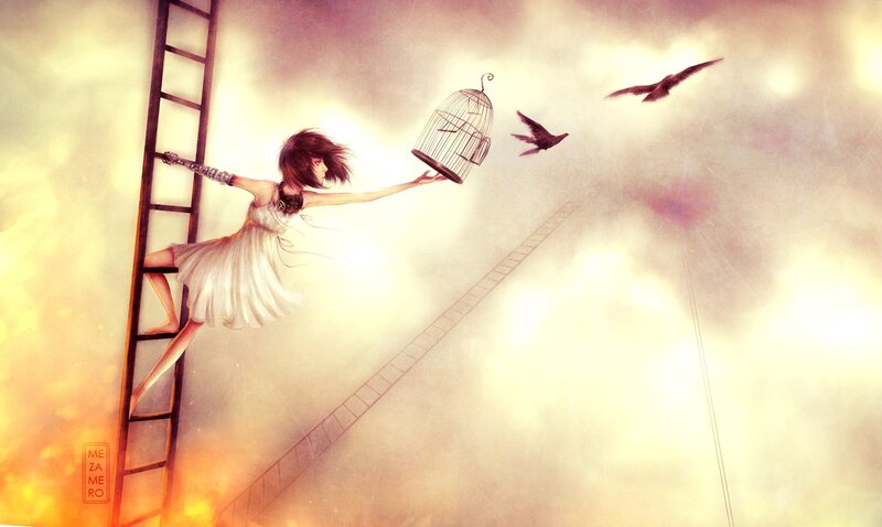 girl releasing birds from a cage