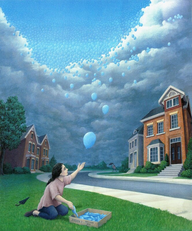 Girl releasing blue balloons