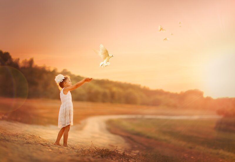Girl Releasing Doves — Orange
